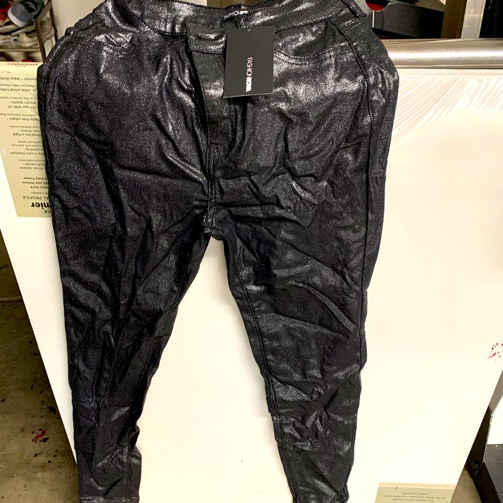 Black sparkly pants. Stretchy.